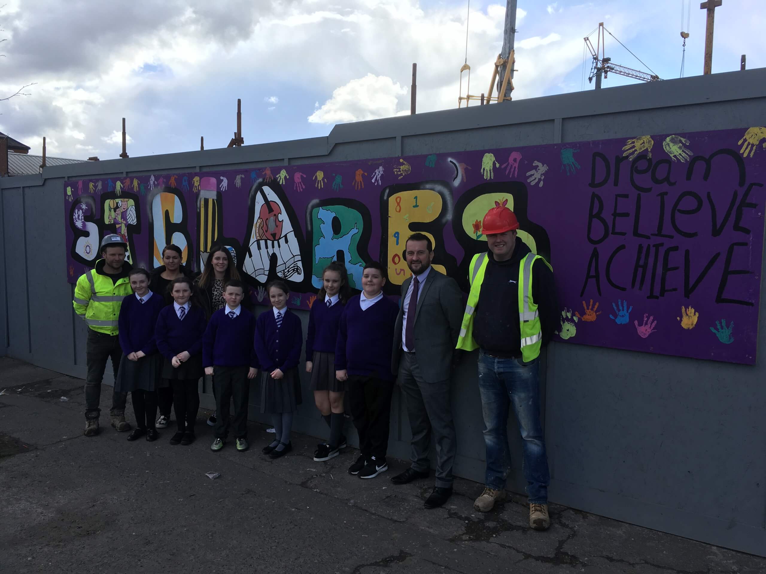 Site hoarding St Clares 1 - Our role as a Social Housing Contractor in Northern Ireland